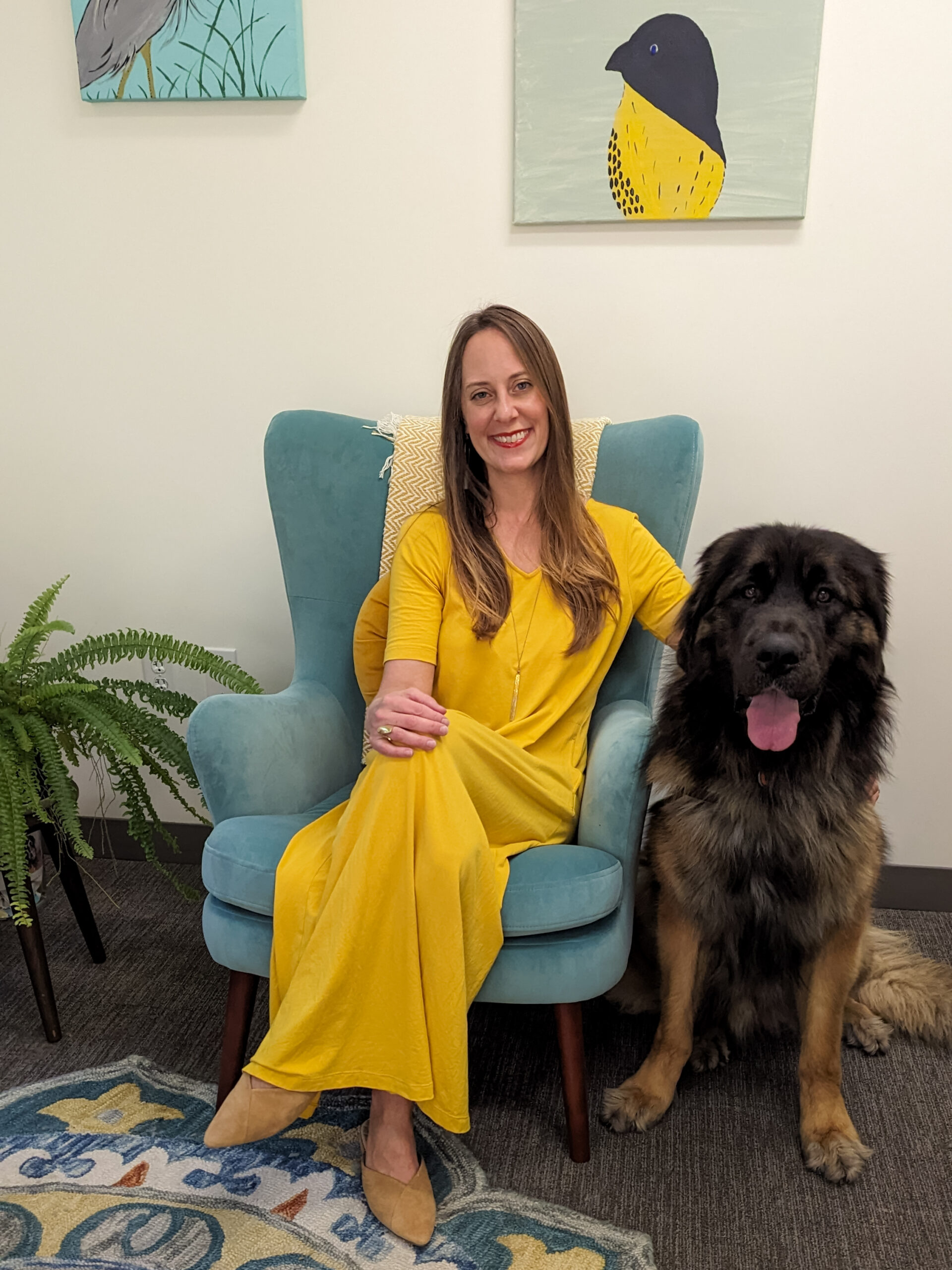 Shaylin Maddox, LMFT with her Therapy dog, Leon | Wellspring Psychology